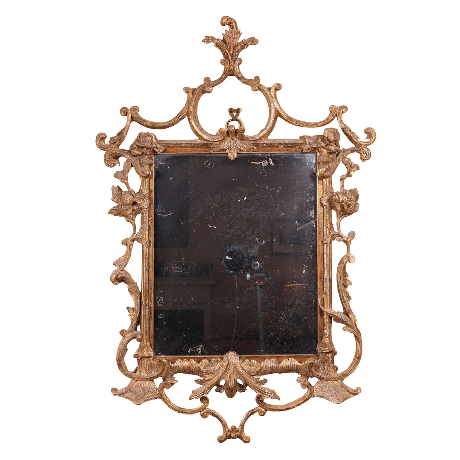 Small giltwood George III rococo mirror with ornate scroll and foliate carvings Collection TH30 circa 1760 England