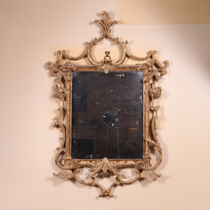 Small giltwood George III mirror with rococo scrolls and foliate decoration Collection TH30 circa 1760 England