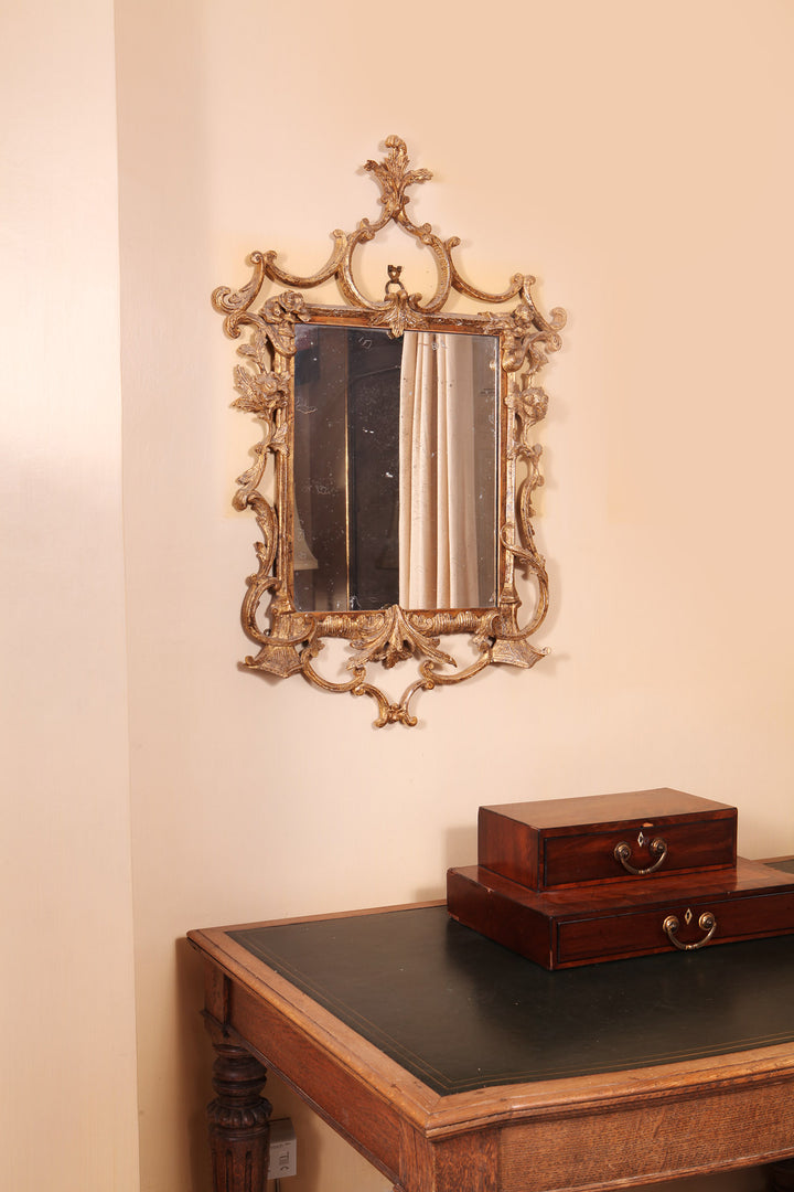 Small giltwood George III rococo mirror with carved scrolls and foliate details by Collection TH30 England circa 1760