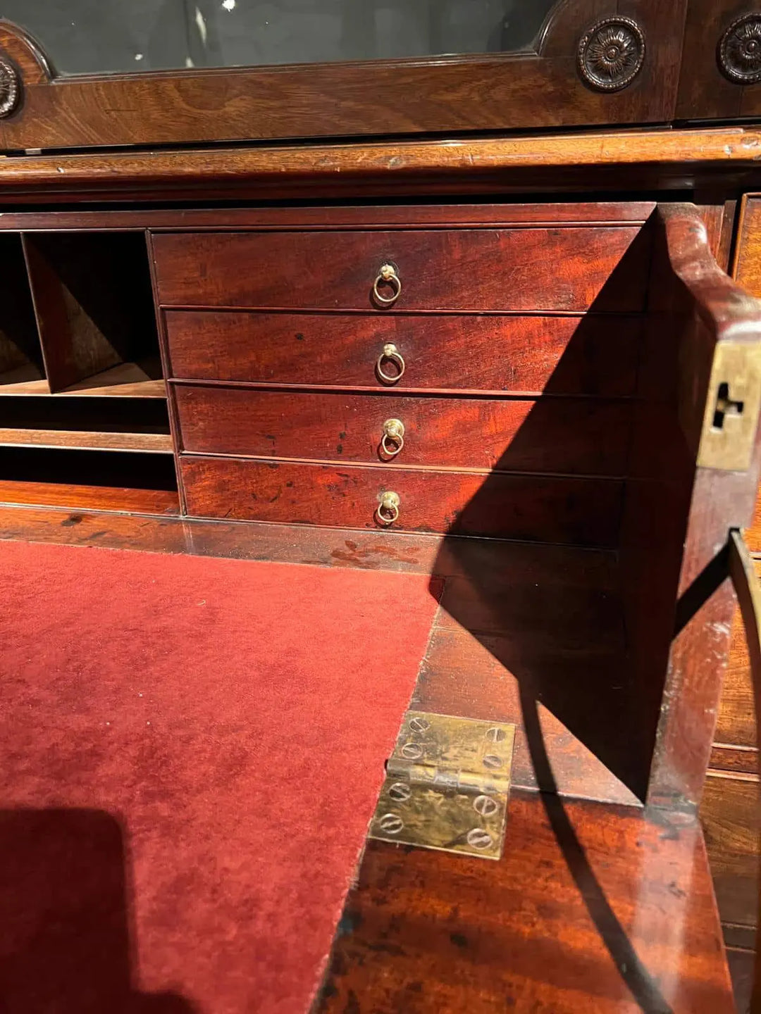 Close-up of Ince and Mayhew George III secretaire drawers and red desk interior by Nwtiques