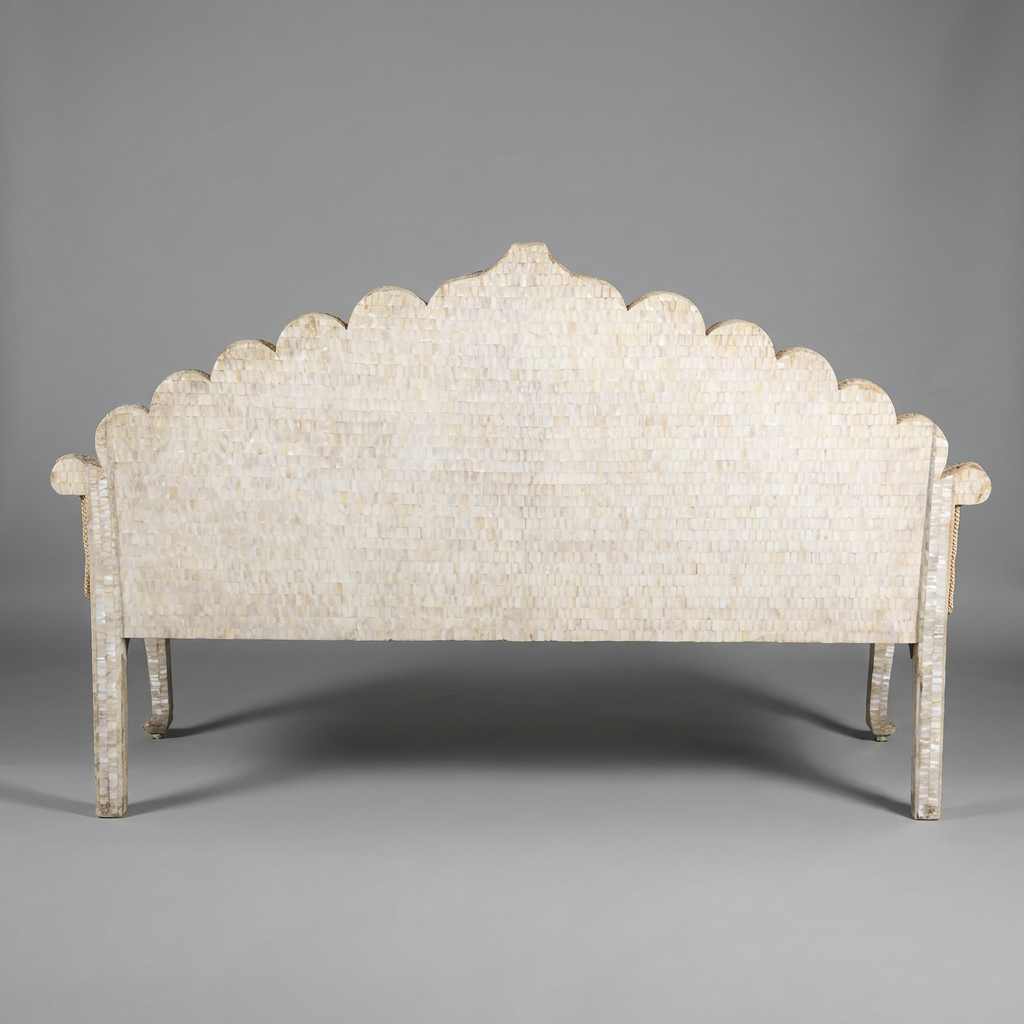 Decorative headboard with scalloped edge on a gray background