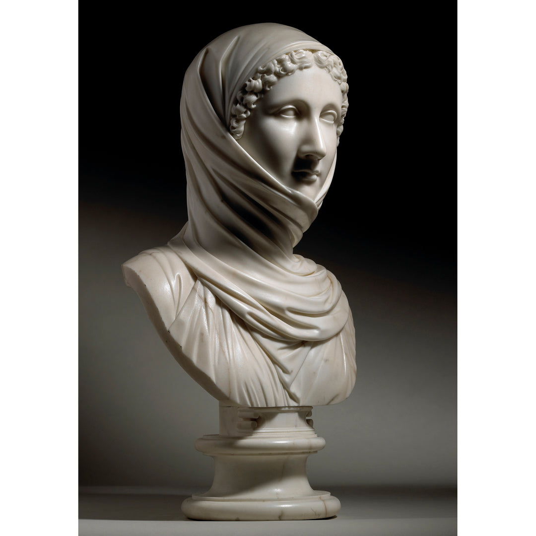 Carlo Albacini marble bust “La Zingarella” displayed by Nwtiques with detailed sculpted drapery and serene expression