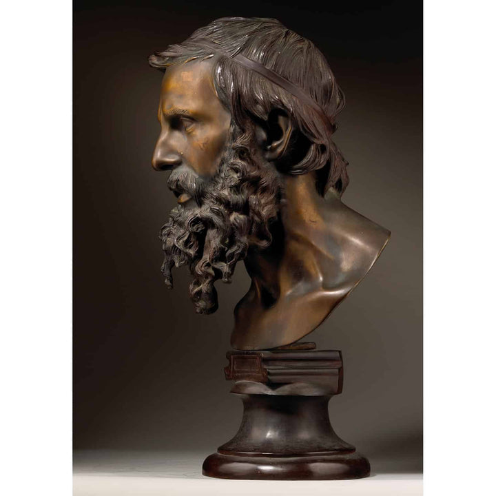 Vincenzo Gemito bronze bust of a philosopher with detailed curly beard and classical patina on wooden base.