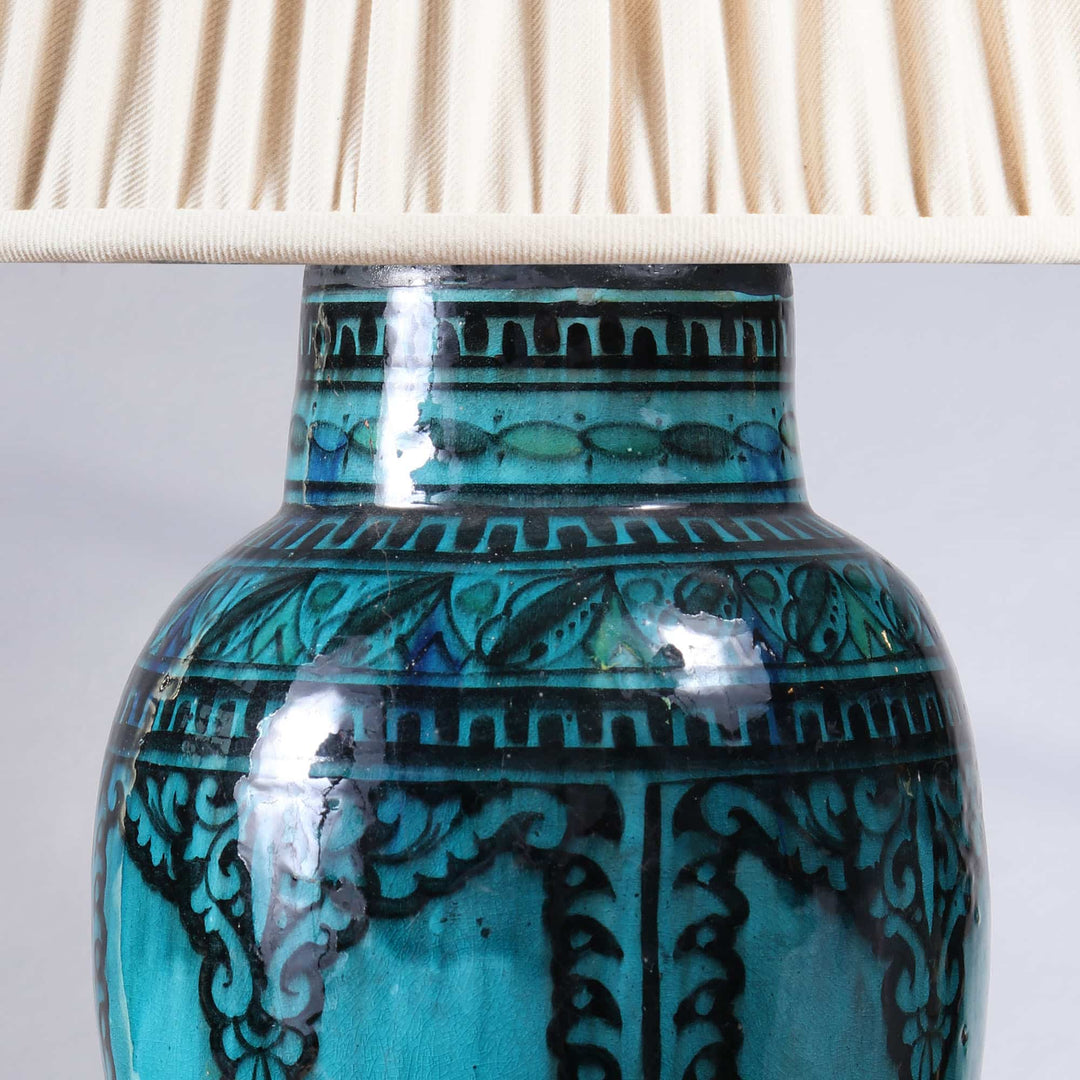 North African Turquoise Vase as a Table lamp III with intricate black patterns and beige fabric lampshade, circa 1950 Morocco.