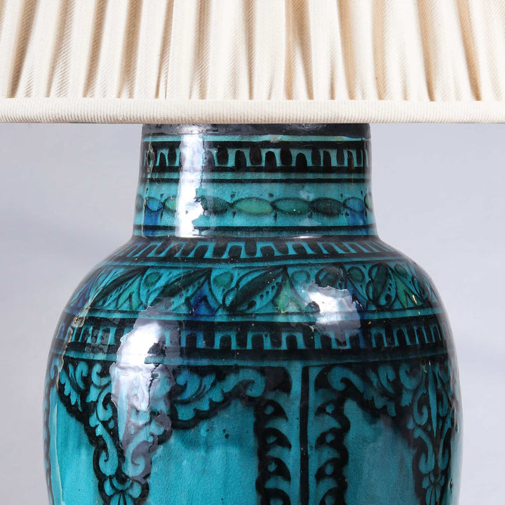 North African Turquoise Vase as a Table lamp III with intricate black patterns and beige fabric lampshade, circa 1950 Morocco.