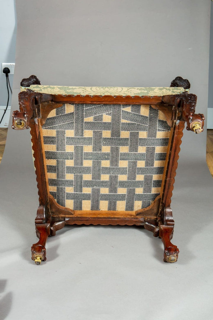 Underside view of a 19th Century mahogany library chair with woven seat support from Collection CK20
