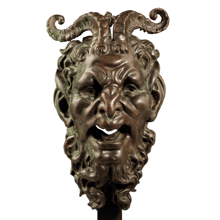 Bronze mask of a Satyr Fountain Head with curled horns and detailed face, Italian, patinated bronze, circa 1800.