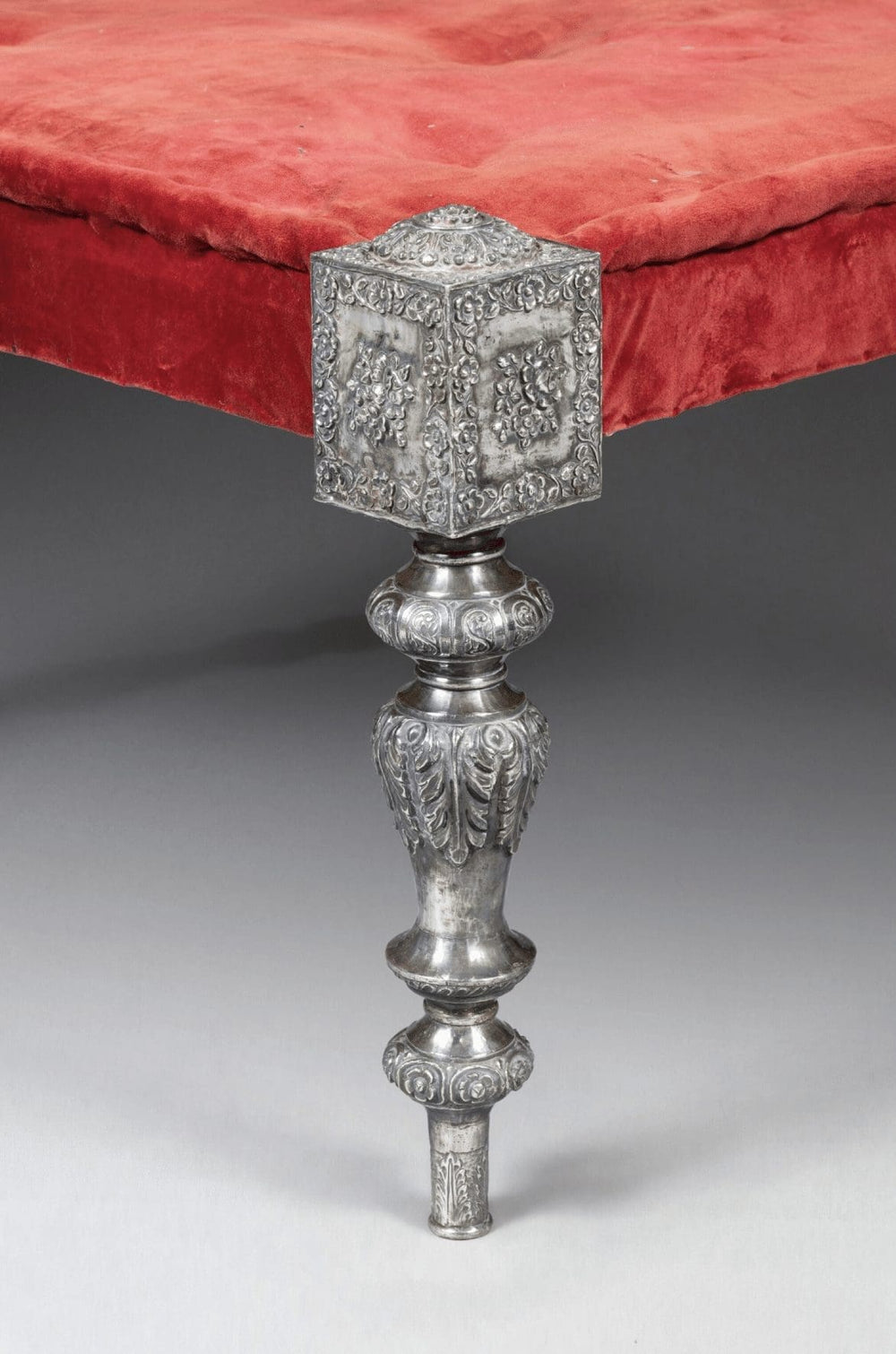 Close-up of Rajasthani silver mounted stool leg with red velvet seat by Collection EE30
