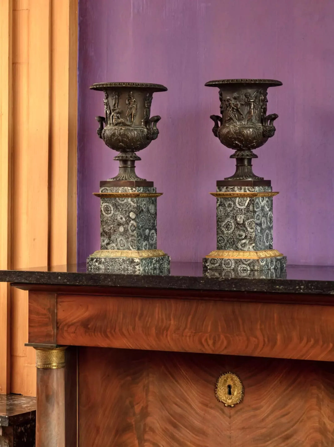 Pair of bronze and orbicular diorite Medici Borghese vases on wooden mantel Collection EE20