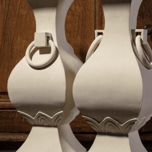 Pair of Classical Chinese Lamps with white painted carved wooden baluster bases and ring handles in white wash finish.