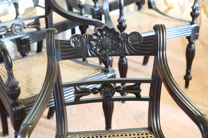 Set of six Anglo-Indian ebony armchairs with carved shell and floral motifs by Collection EE30