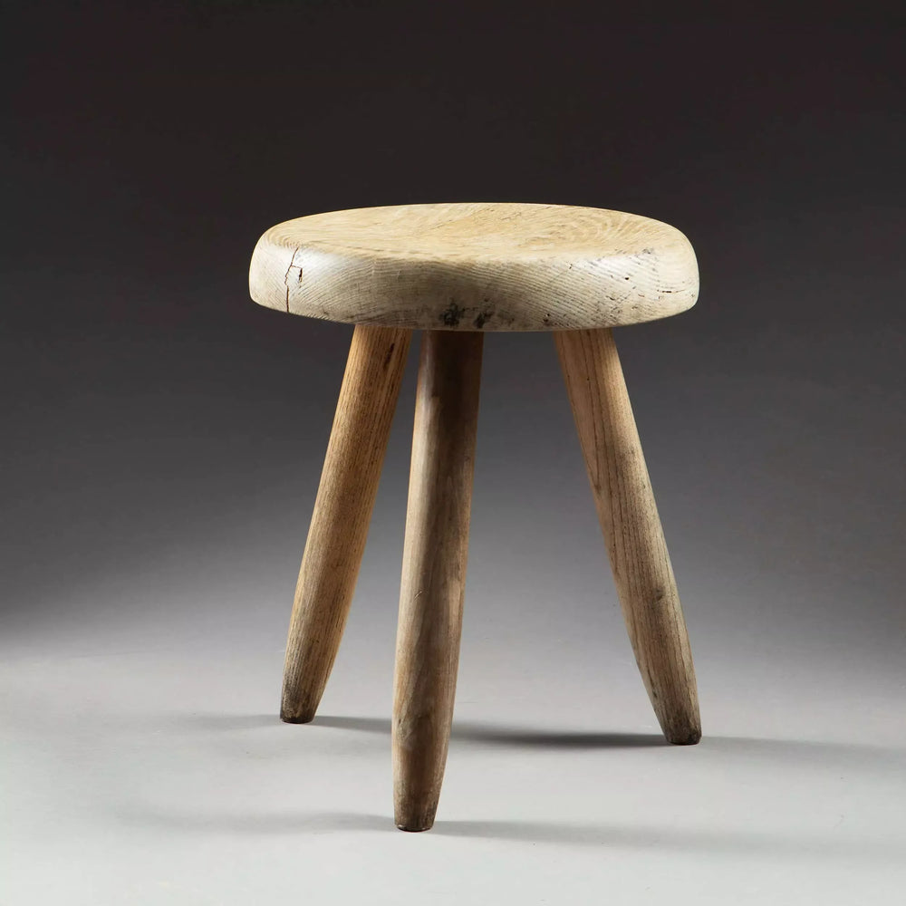 Charlotte Perriand Berger Stool in turned ash wood from Collection EE30, showcasing mid-century French design.