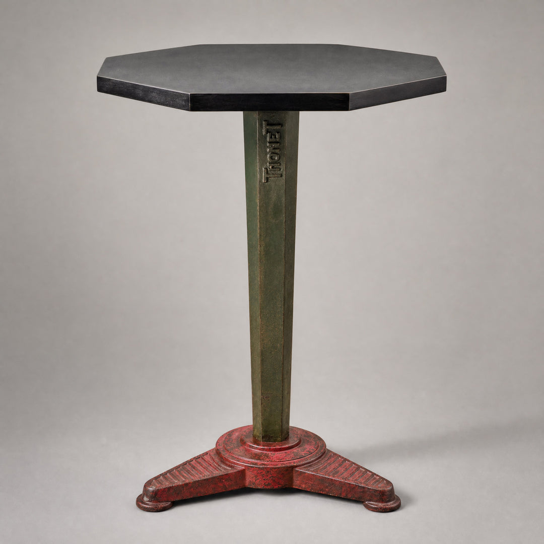 An Art Deco cast iron Thonet occasional table