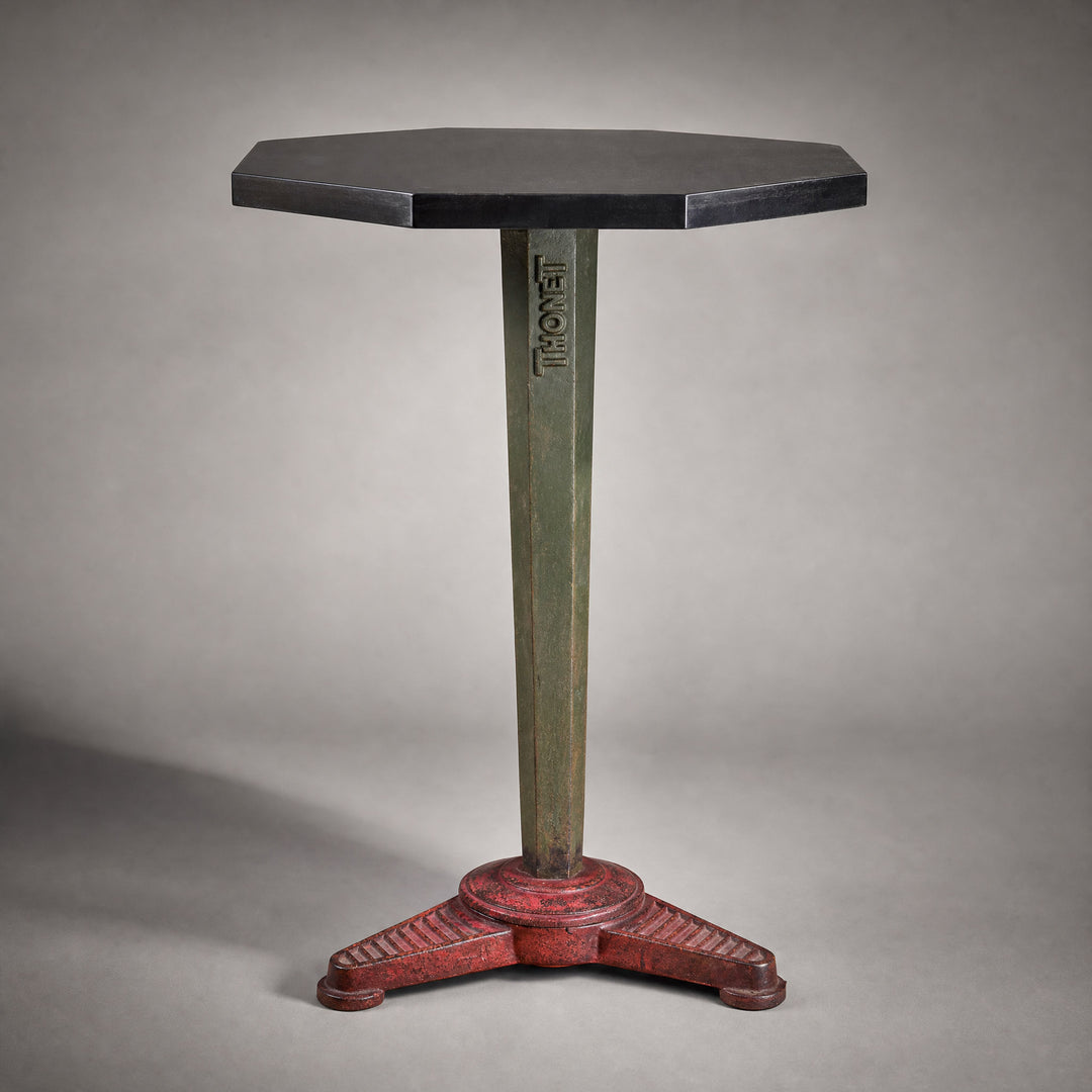 An Art Deco cast iron Thonet occasional table