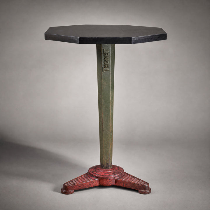 An Art Deco cast iron Thonet occasional table
