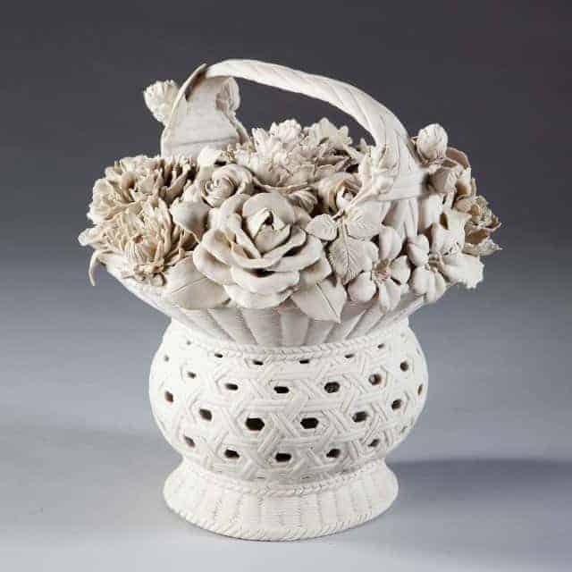 Continental biscuit porcelain basket of flowers with intricate pierced design by The Sold Archive