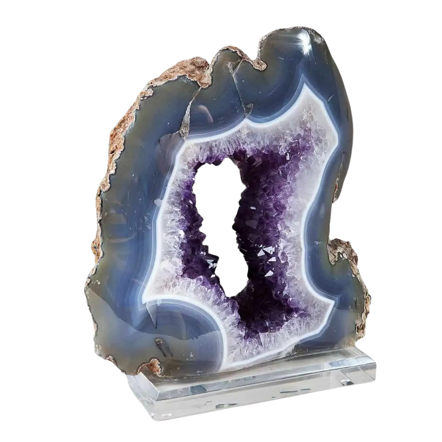 Rare blue agate geode with amethyst crystals on clear stand from Collection CK10 displayed against white background