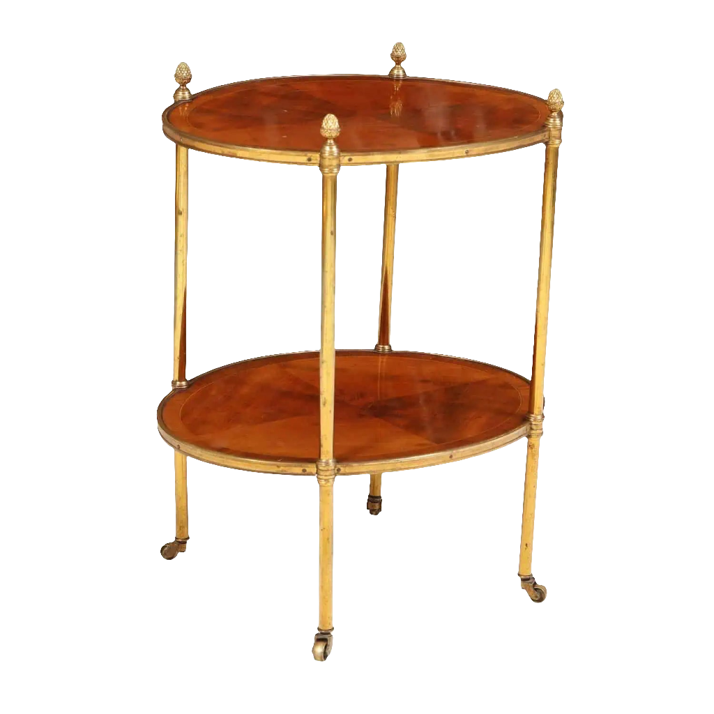 Quarter Veneered Bookmatched Mahogany Oval 2 Tier Table with brass frame and casters, England circa 1910.