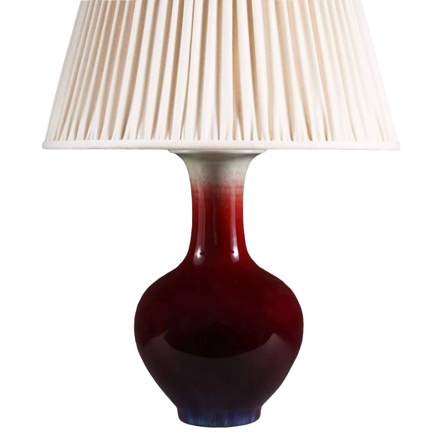 Chinese Sang de Boeuf Vase mounted as a table lamp with pleated white shade, China, circa 1980, height 27 cm.