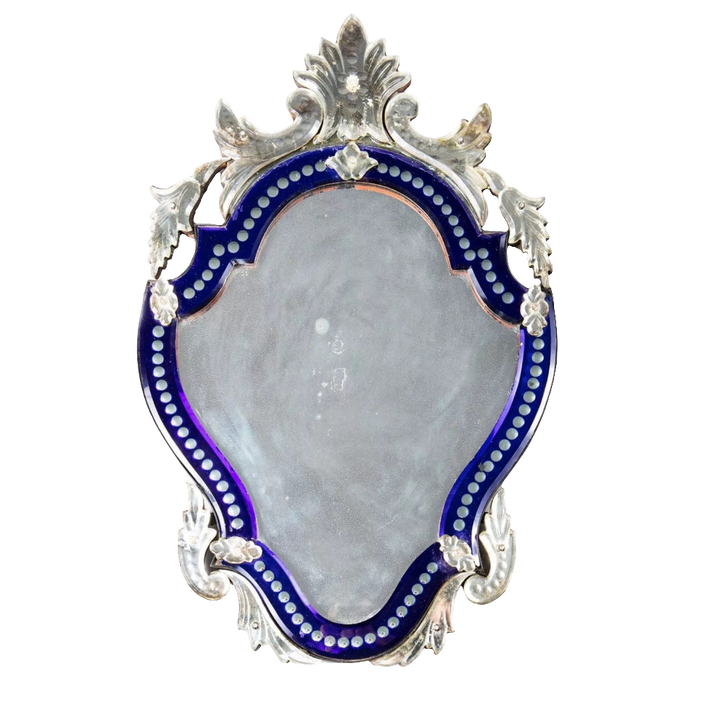 Early 20th Century Venetian blue border glass mirror with a shaped bevelled plate and foliate details.