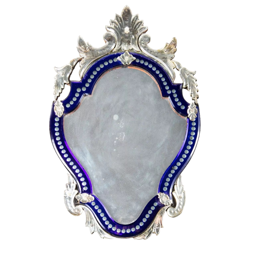 Early 20th Century Venetian blue border glass mirror with a shaped bevelled plate and foliate details.