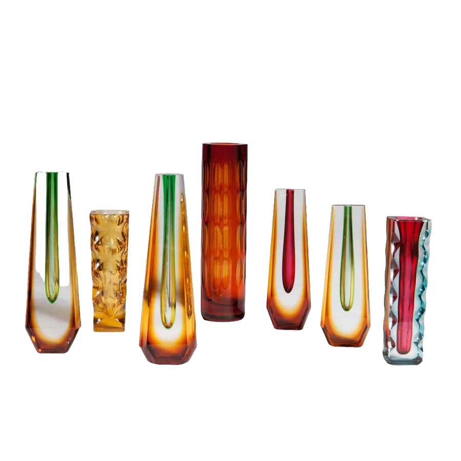 Seven mid century Bohemian coloured glass vases with intricate faceting by Collection TH20, showcasing timeless artistry and design.