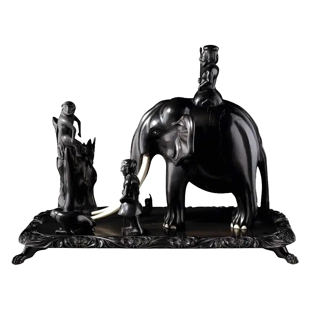 19th century Anglo Indian carved ebony elephant group with mahouts and monkey on tree by Nwtiques