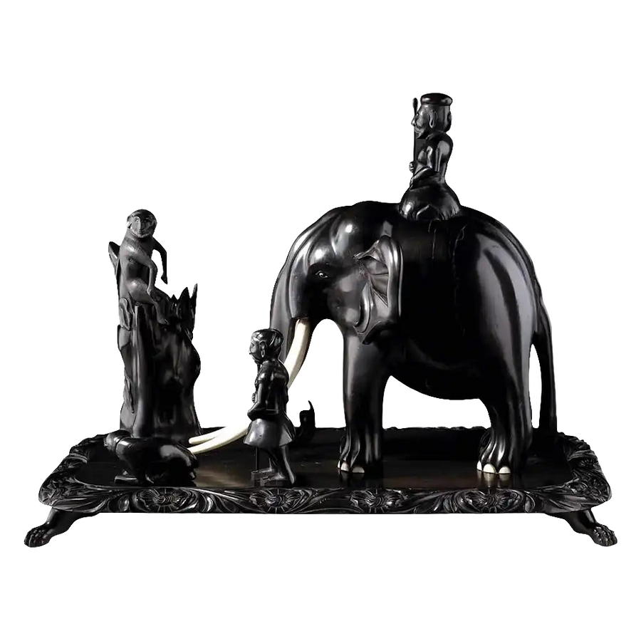 19th century Anglo Indian carved ebony elephant group with mahouts and monkey on tree by Nwtiques