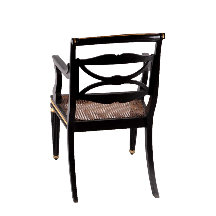 Regency parcel gilt armchair with cane seat and brass feet from Collection TH20, circa 1820 England.