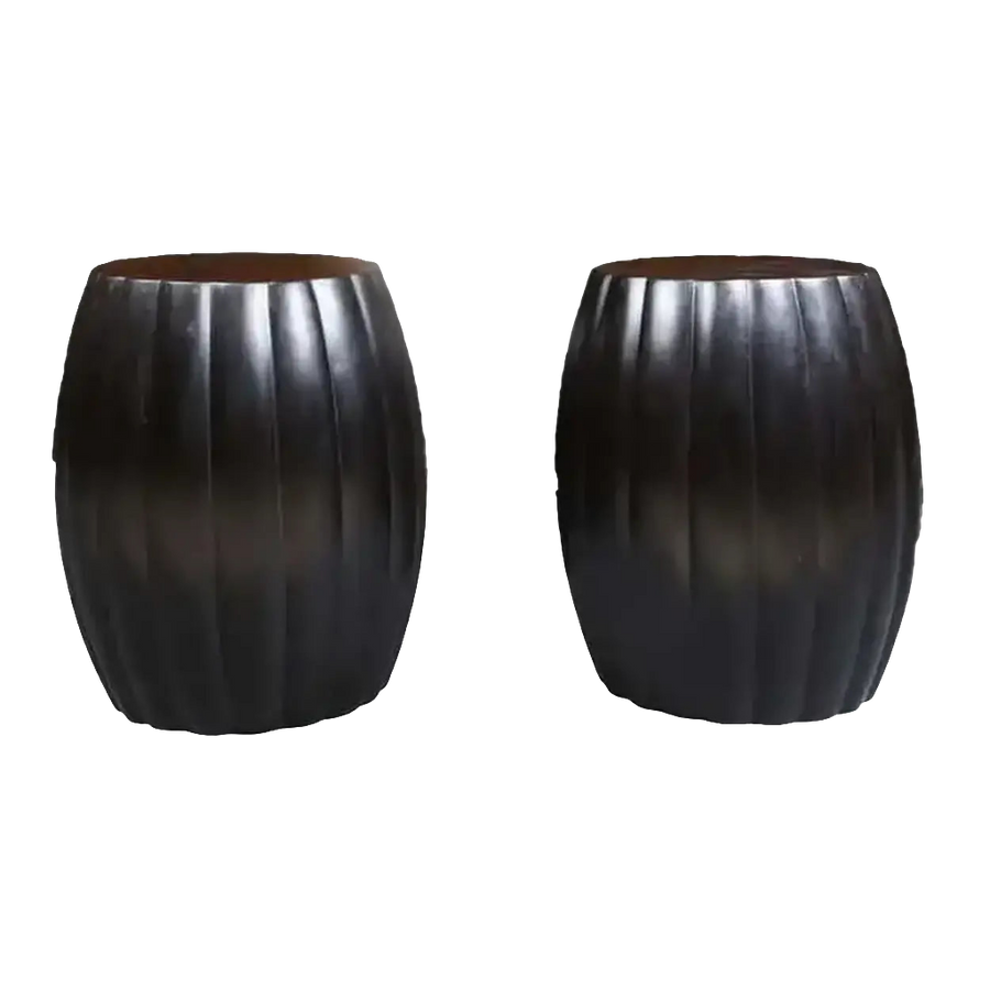 Pair of polished ebony stools with sleek vertical grooves from Collection EE30 elegant modern design