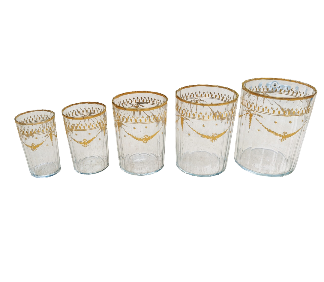 Set of five 18th century Bohemian gilt beakers with floral garlands by Nwtiques