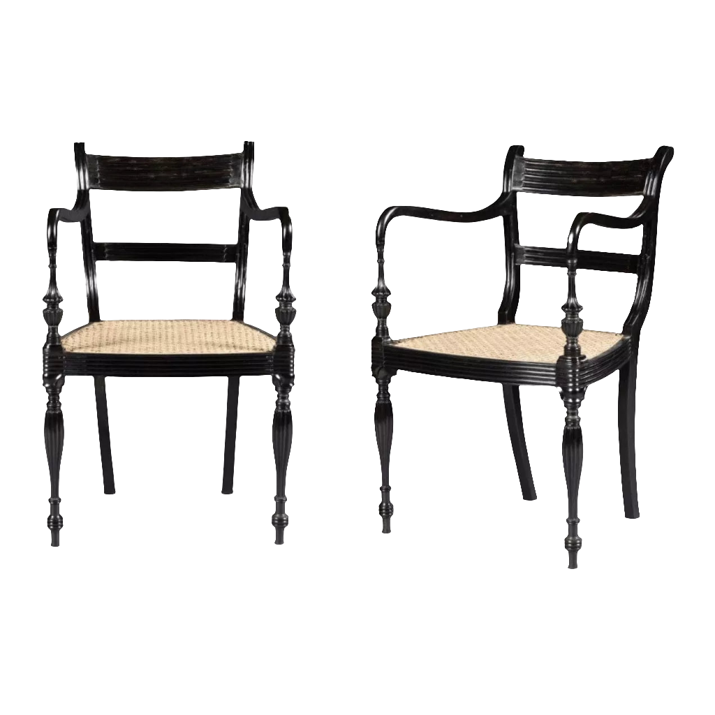 Pair of Anglo-Ceylonese ebony open armchairs with hand-caning, circa 2000, available from The Sold Archive.