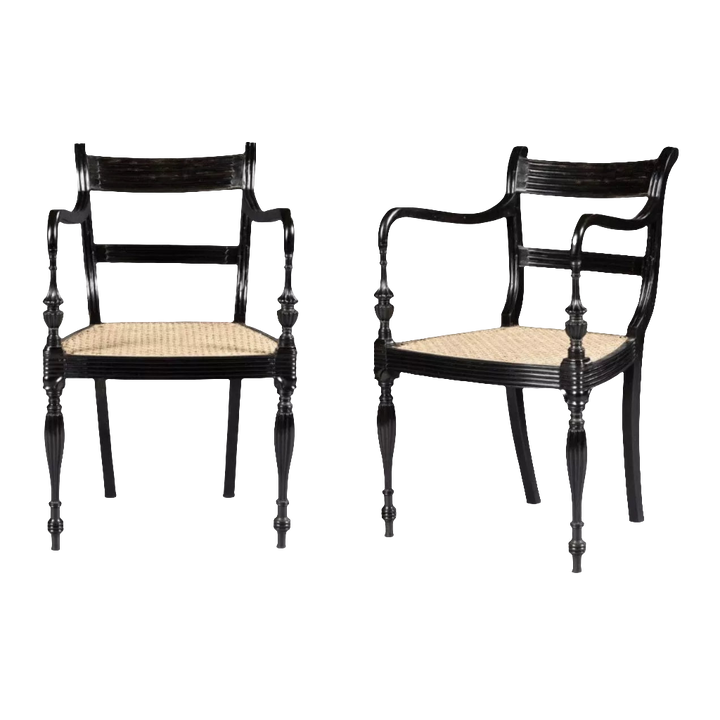 Pair of Anglo-Ceylonese ebony open armchairs with hand-caning, circa 2000, available from The Sold Archive.