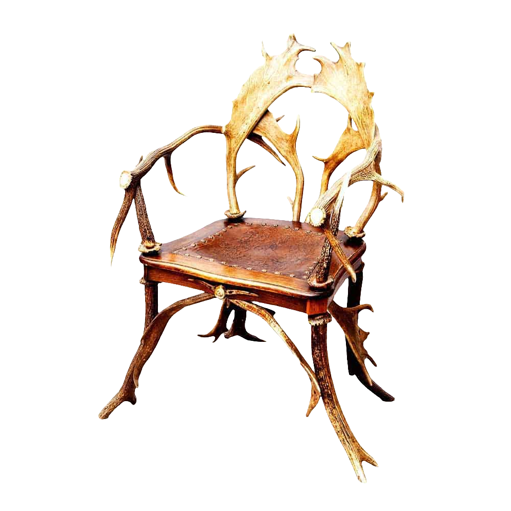 Victorian Black Forest antler armchair from Nwtiques with intricately carved antler frame and leather seat