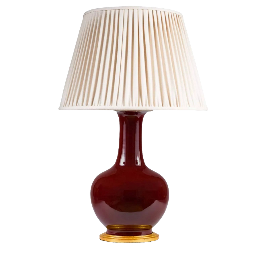 Chinese Sang de Boeuf Glazed Vase mounted as a Table lamp with pleated cream shade and gilt wooden base.
