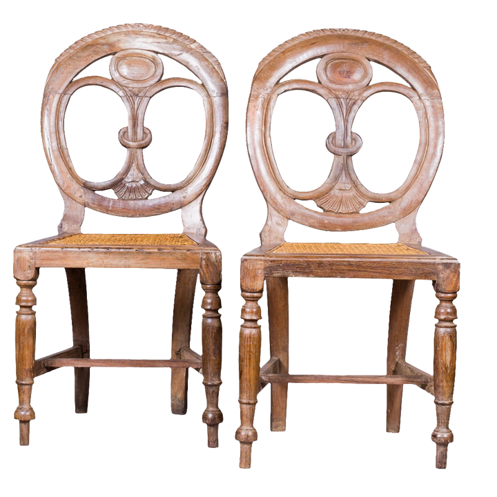 Pair of 19th century Goan side chairs with pierced oval backs and cane seats by Nwtiques