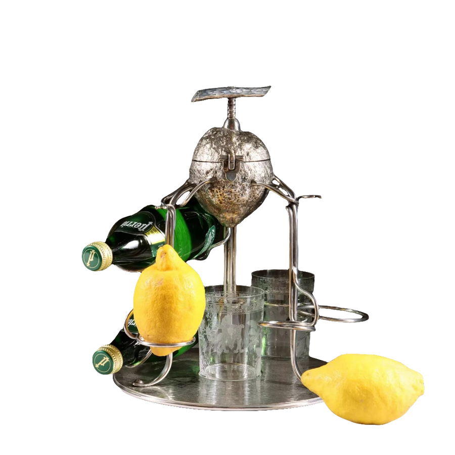 Late 19th-century Hukin and Heath silver plate lemon squeezer with bottle and glass supports by The Sold Archive