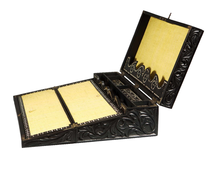 Mid-19th century Anglo Ceylonese ebony writing slope with intricate carvings, by Nicholas Wells Antiques.