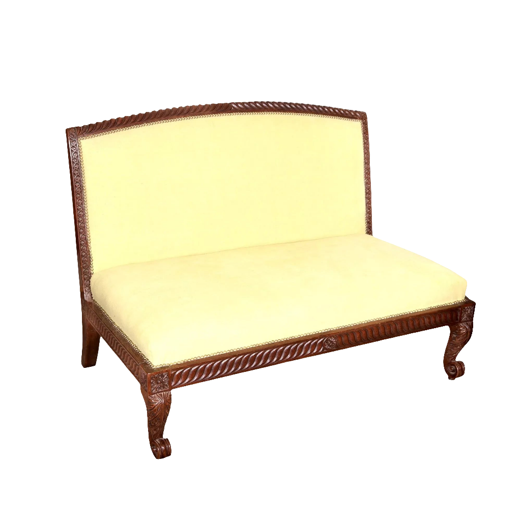Anglo-Indian hardwood carved settee with cream upholstery by Collection TH20, featuring intricate 19th-century woodwork.