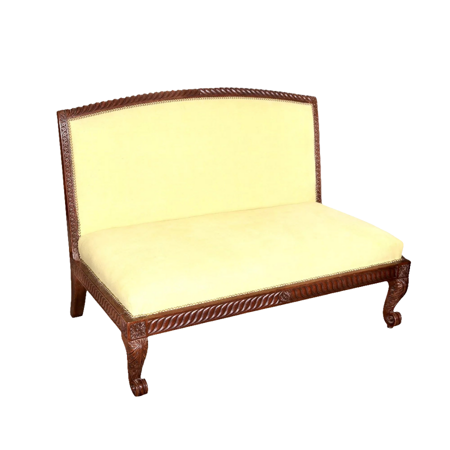 Anglo-Indian hardwood carved settee with cream upholstery by Collection TH20, featuring intricate 19th-century woodwork.