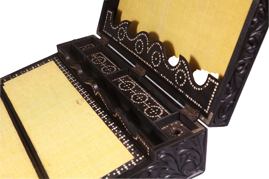 Mid-19th century Anglo Ceylonese ebony writing slope with carved foliate details by Nicholas Wells Antiques.
