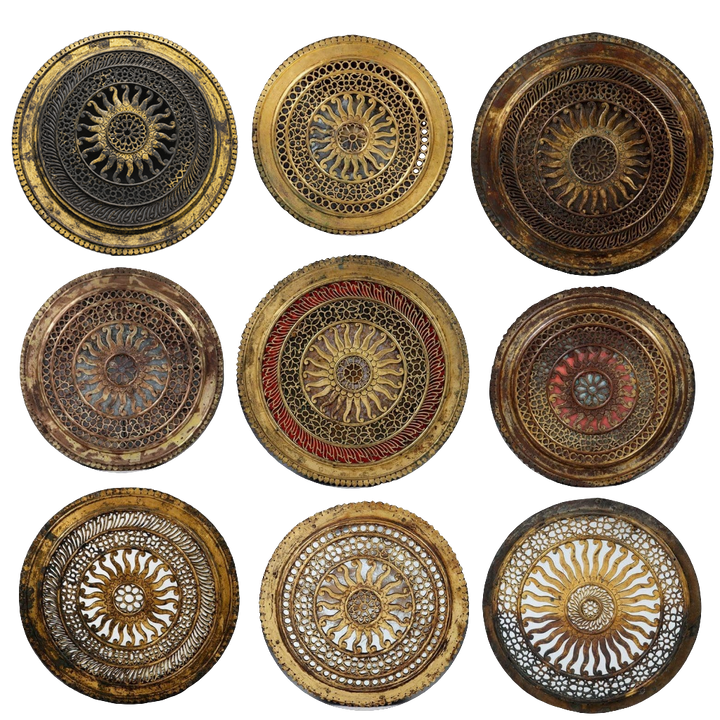 Group of Nine pierced gilt copper mirrored Chakras