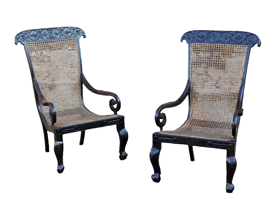 Pair of 19th century Anglo Indian solid ebony caned armchairs with carved vine details by ANTIQUES