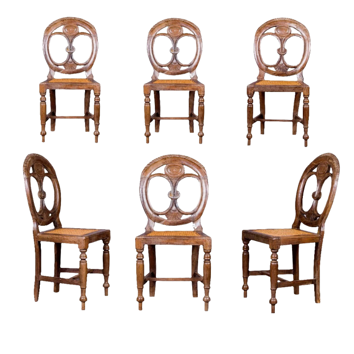 Set of six 19th century Goan side chairs with pierced oval backs and caned seats by Nwtiques