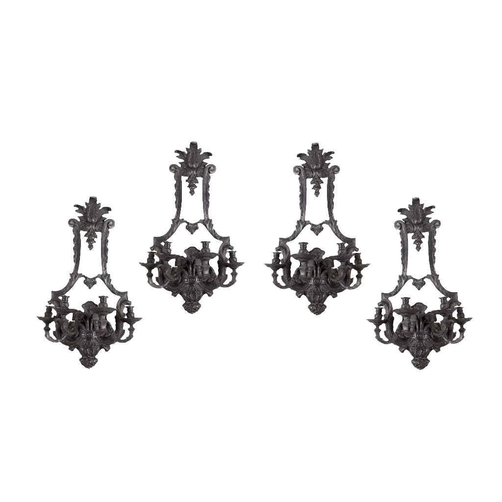 Set of four Louis XIV style bronze four light wall appliques by Collection TH10 with ornate baroque design