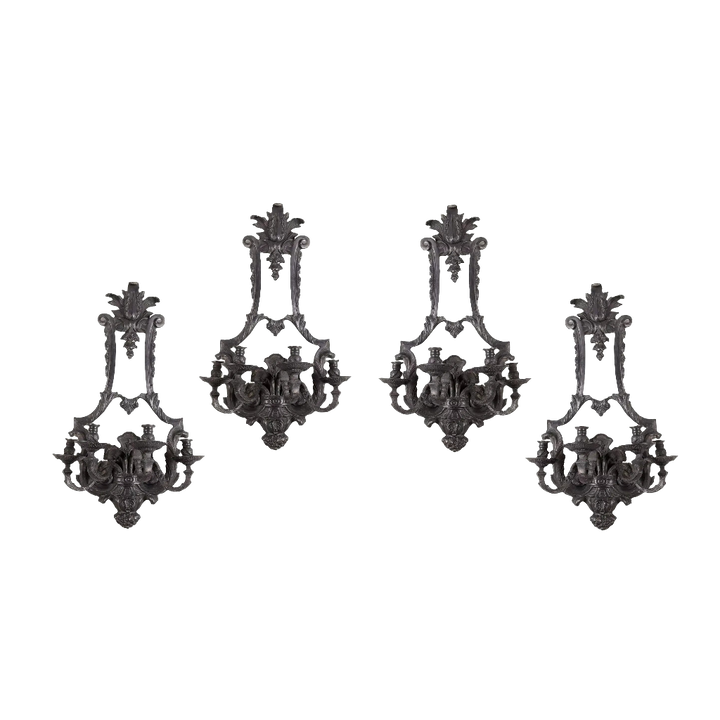 Set of four Louis XIV style bronze four light wall appliques by Collection TH10 with ornate baroque design