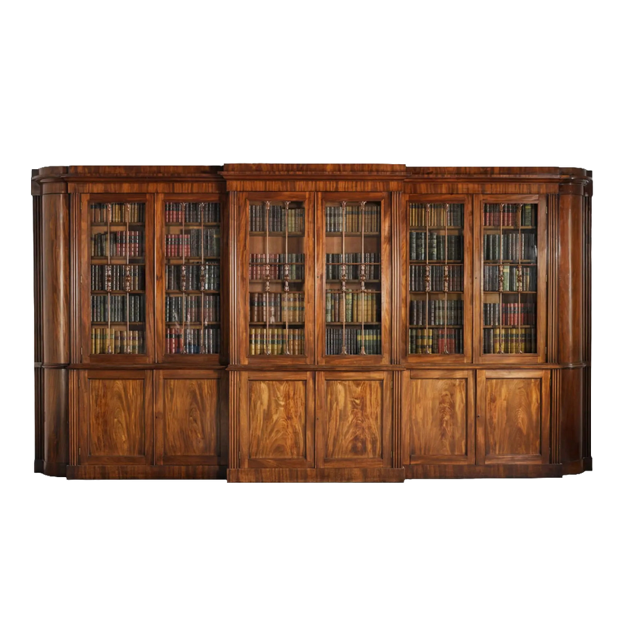 Regency mahogany breakfront bookcase by Gillows, circa 1815, offered by Nwtiques with glass doors and classical design.