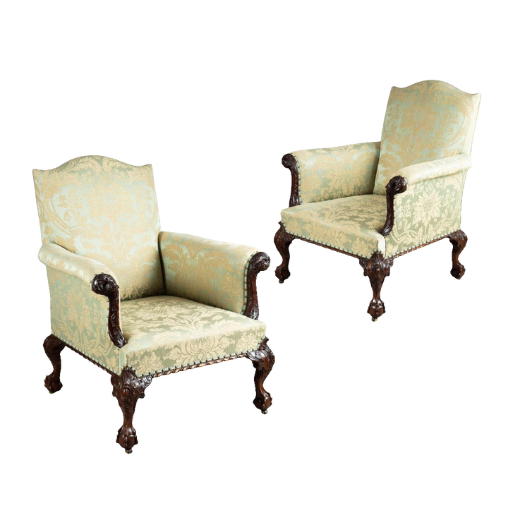 A pair of 19th Century English library chairs with carved mahogany and silk upholstery by Collection CK20