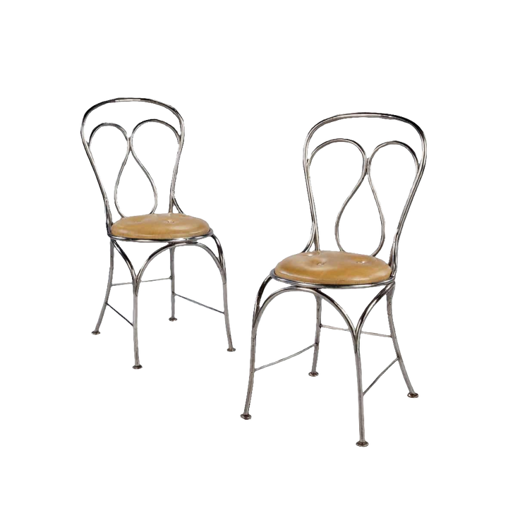 Pair of tubular steel chairs with leather seats in the style of Thonet by Collection TH20, circa 1900.