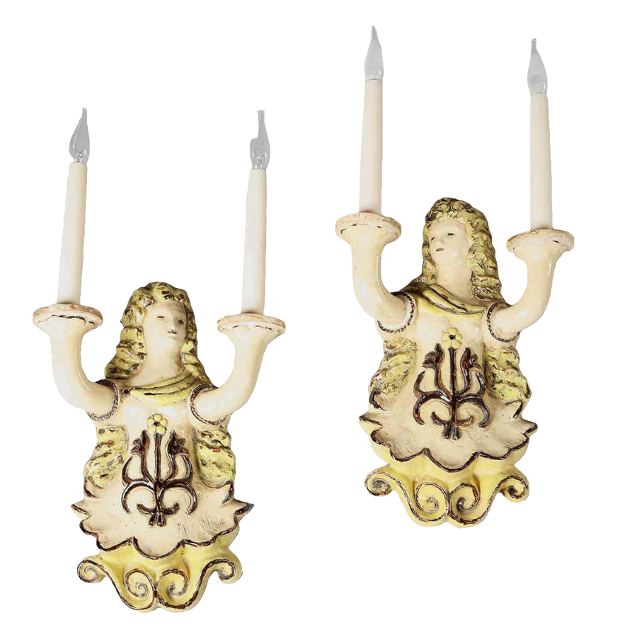 Pair Vallauris ceramic wall lights with ornate female figure design by Collection ES10, circa 1950 French origin